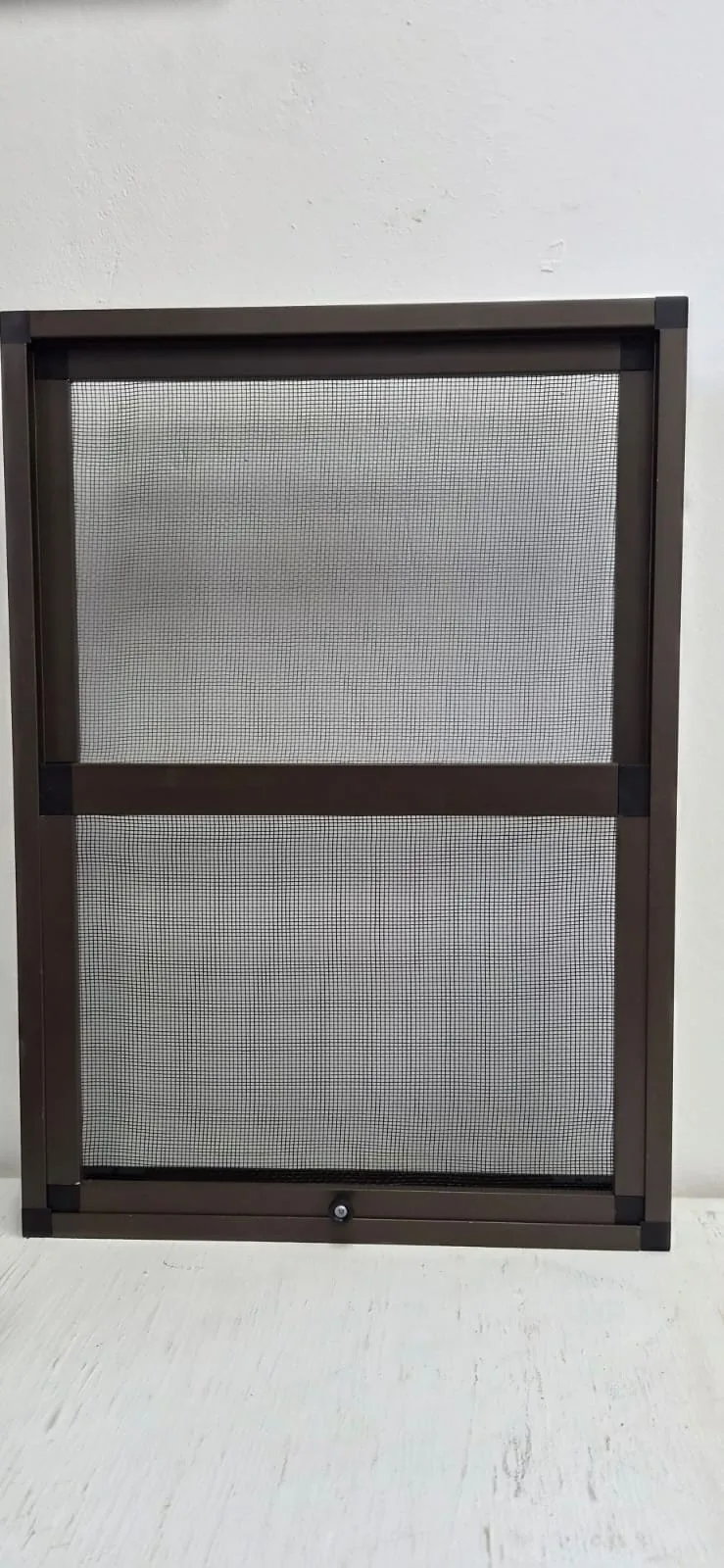 Bronze aluminium vertical-sliding flyscreen with fine insect mesh